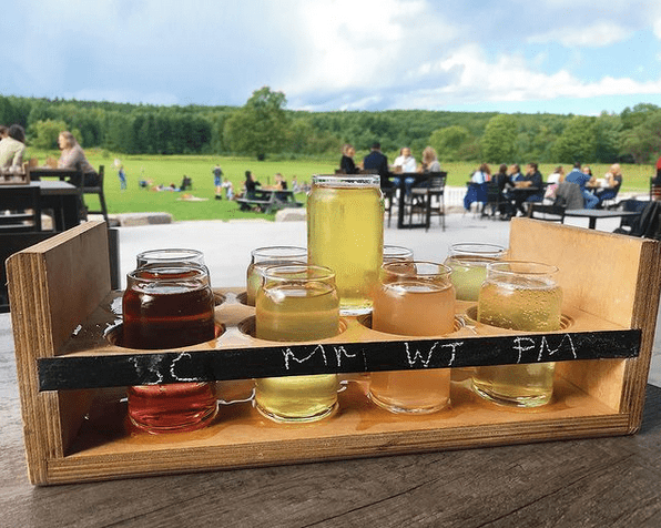 photo of a tasting flight overlooking the patio at Slabtown Cider Co.