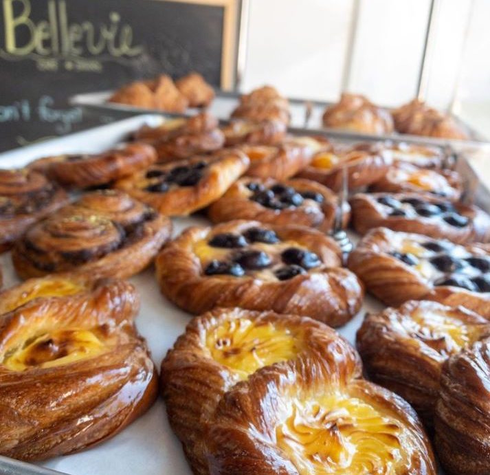Close up of danishes with a variety of flavours.