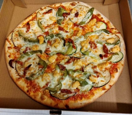 Close up of the Roadrunner Pizza from Tuscan Wolfe.